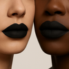 close up of 2 models of different skin tones light and deep wearing black lipstick. 