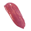 Pink glittery lip gloss swatch on a white background