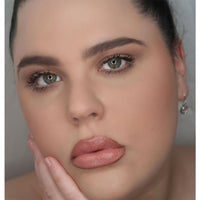 woman wearing peach lipstick
