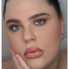 woman wearing peach lipstick