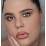 woman wearing peach lipstick