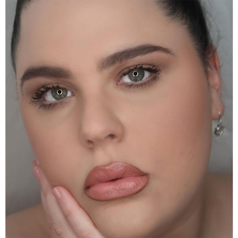 woman wearing peach lipstick